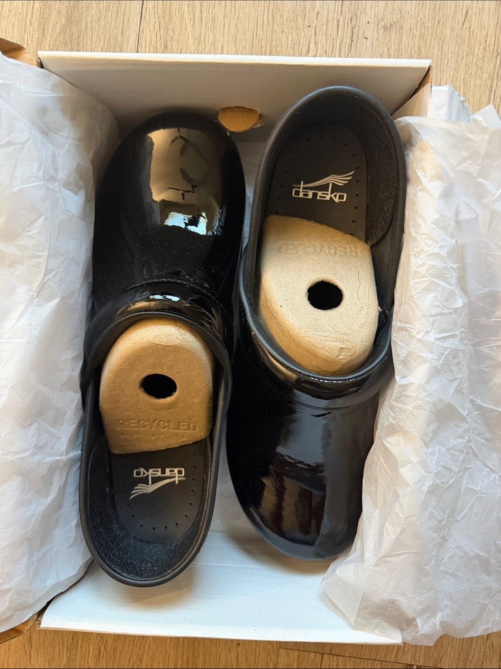 Dansko Black Patent Women's Clogs